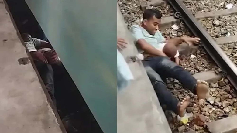 চলন্ত ট্রেনের নিচে শুয়ে সন্তানের জীবন বাঁচালেন বাবা